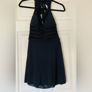 White House Black Market Black Cocktail dress. Size 4.